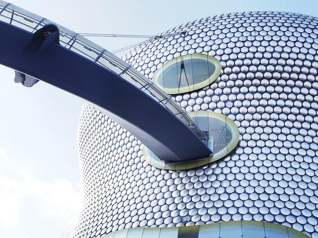 bullring, birmingham, architecture, modern, architectural, building, metal, engineering, curved, steel, concrete, facade, dots, pattern, discs, shopping, centre, structure, design, construction, city, blue shopping, blue construction, blue shop, blue metal, birmingham, birmingham, birmingham, birmingham, birmingham. Birmingham multi-site retail runs local reviews under national brand rules