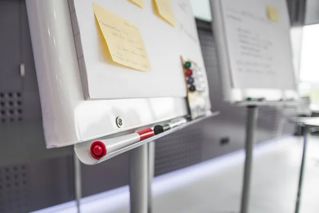 board, pens, sticky notes, workshop, business, office, paper, meeting, event, workplace, work, whiteboard. Reputation management buyer personas: research guide