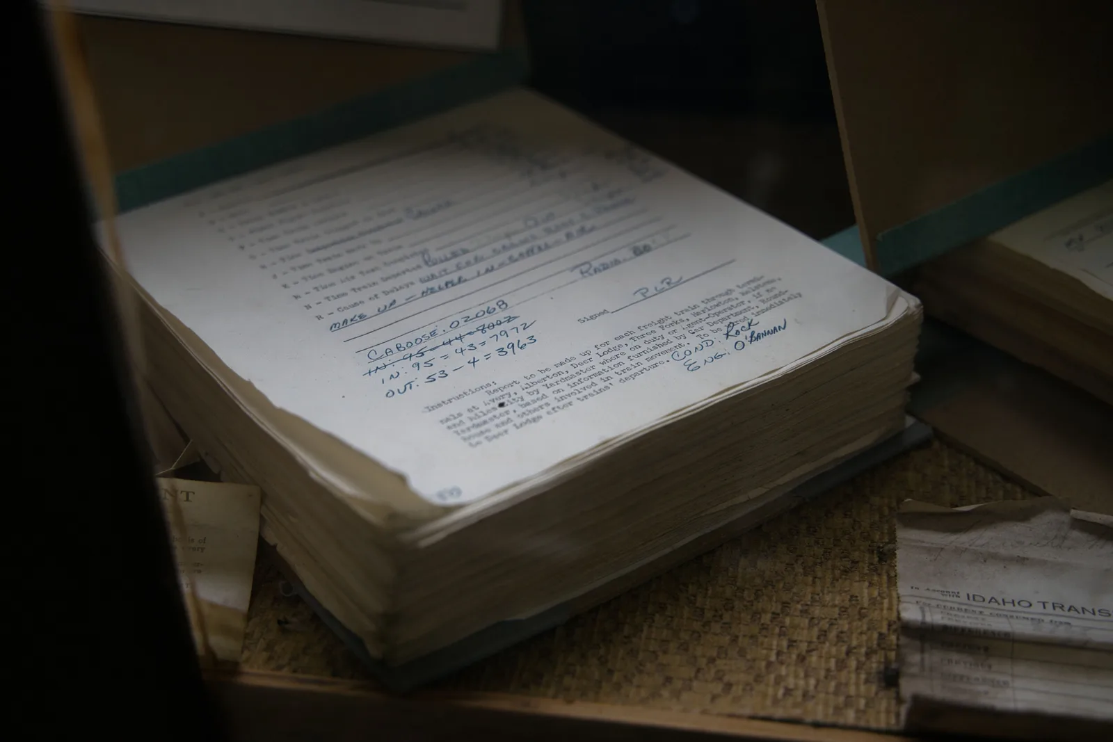 Old railroad papers in Avery, Idaho showcasing historical records and transportation details.